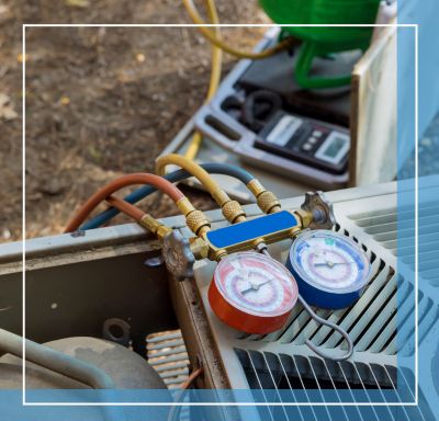 heating and cooling gauges attached to an AC unit
