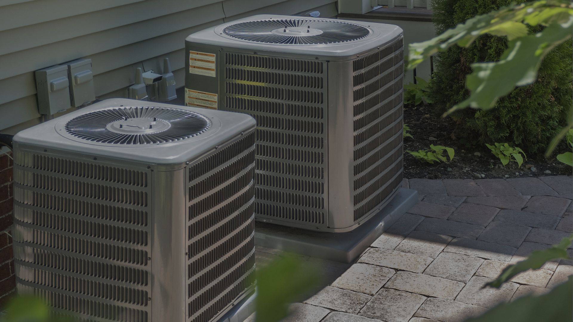 Two air conditioning units outside